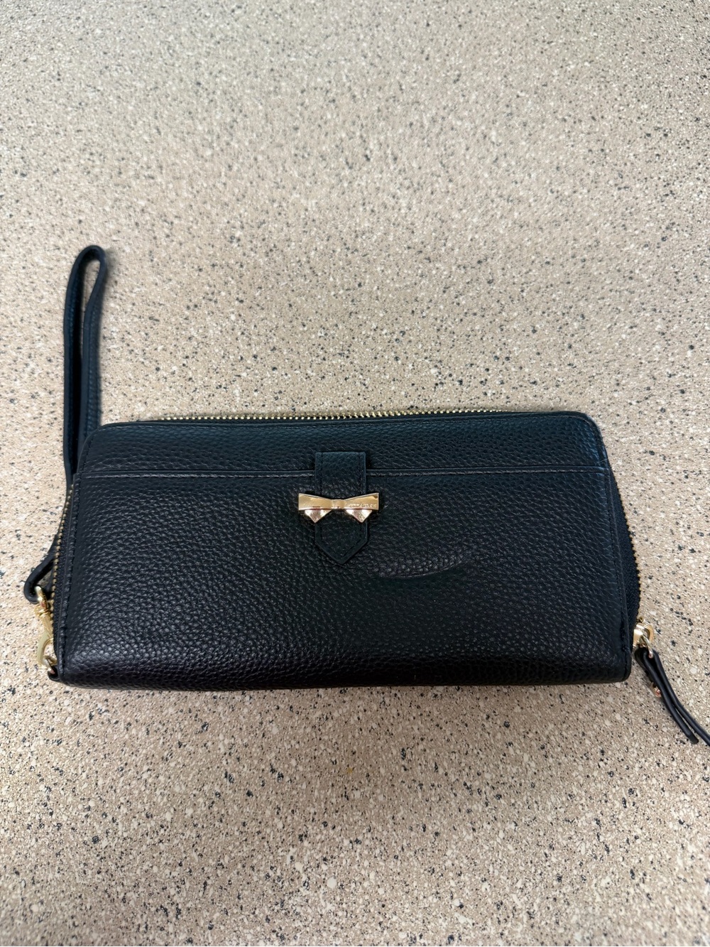 Anne Klein Black Pebbled Leather Wristlet with Gold Bow Detail